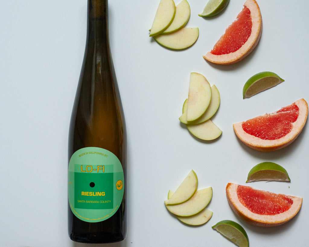 Visual wine tasting notes for Lo-Fi Riesling - wine bottle with grapefruit, green apple, and limes